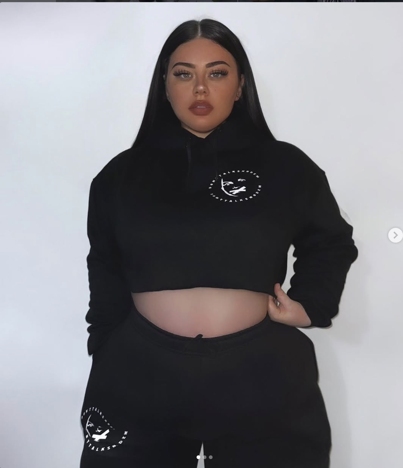 Donttalkshodem — Circular badge on a cropped hoodie and matching trousers