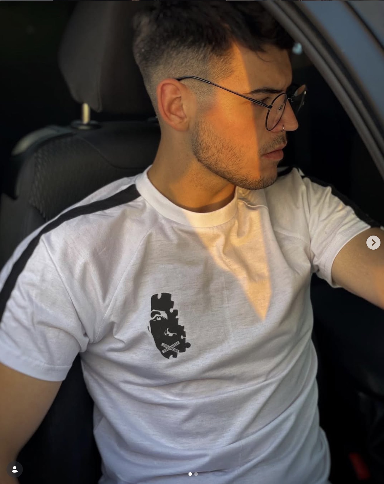 Donttalkshodem — Puzzle-piece face silhouette on a white T-shirt